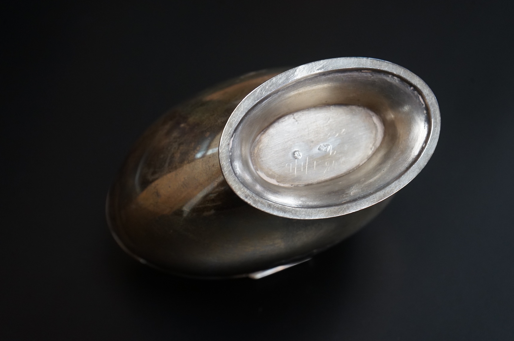 A late Victorian demi-fluted oval tea caddy, by William Hutton & Sons, London, 1894, width 11.1cm, together with a 19th century continental white metal oval tea caddy, possibly French, no key.
